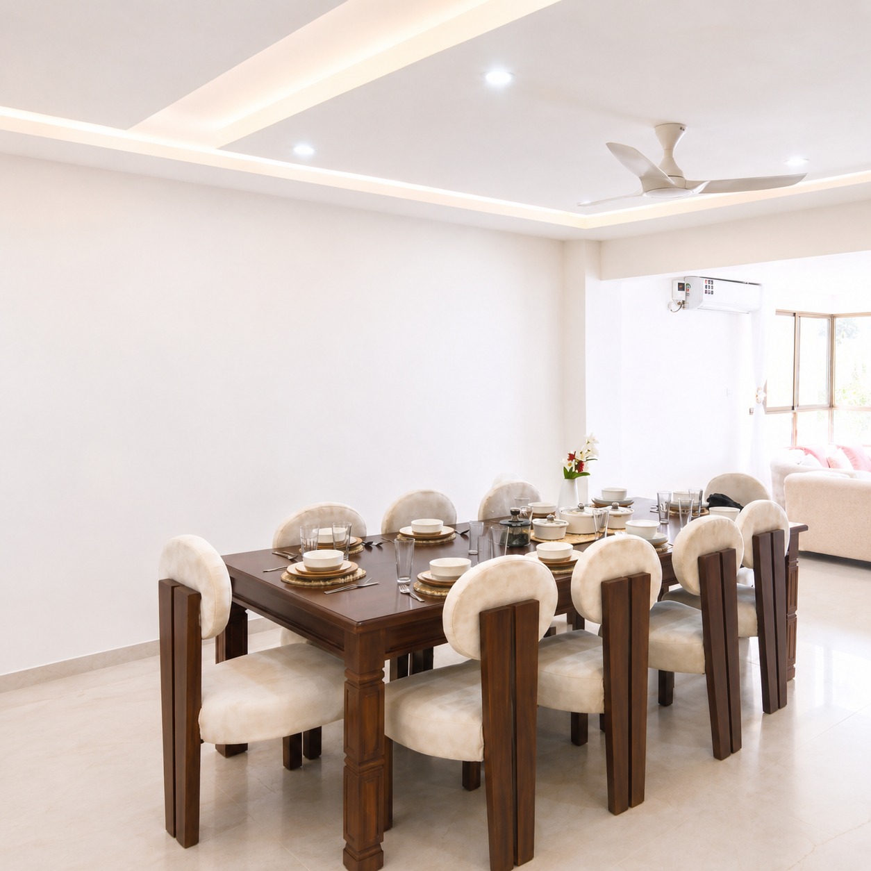 Modern dining area with elegant table setup and comfortable seating